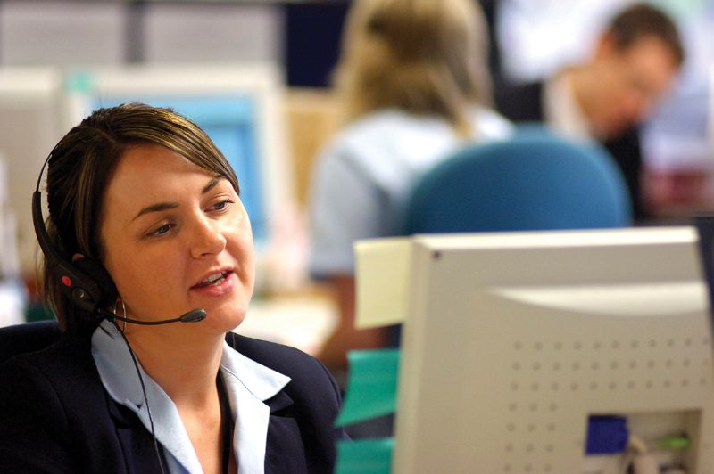 Woman on phone at call centre