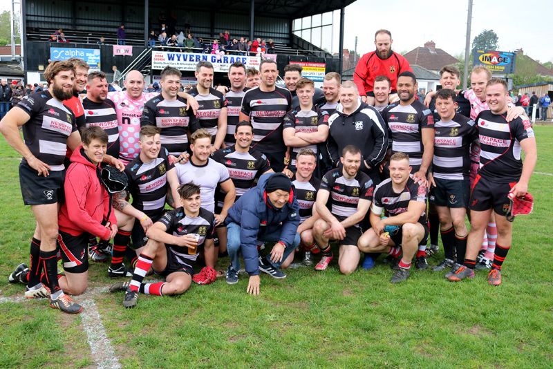 Eddie Jones, front row in the hat, with the Foresters Invitational XV. Wayne Barnes is in the back row, right, in pink shirt.