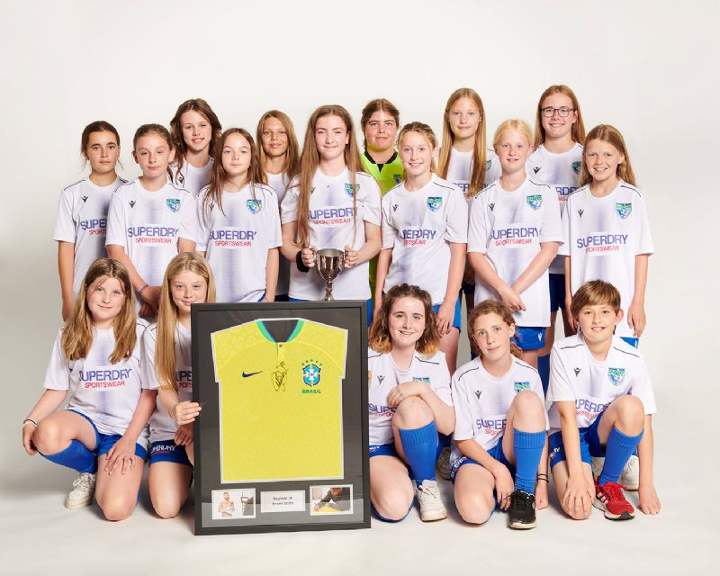 Gotherington Jaguars with the framed signed Neymar shirt