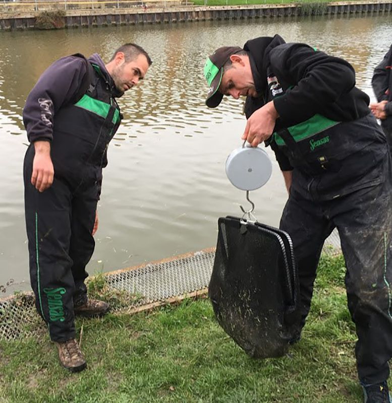 Mickelle Brossier, of Team Florentine France and the individual winner of the 2017 Sensas Challenge on the Gloucester Canal, watching his fish being weighed on the second day