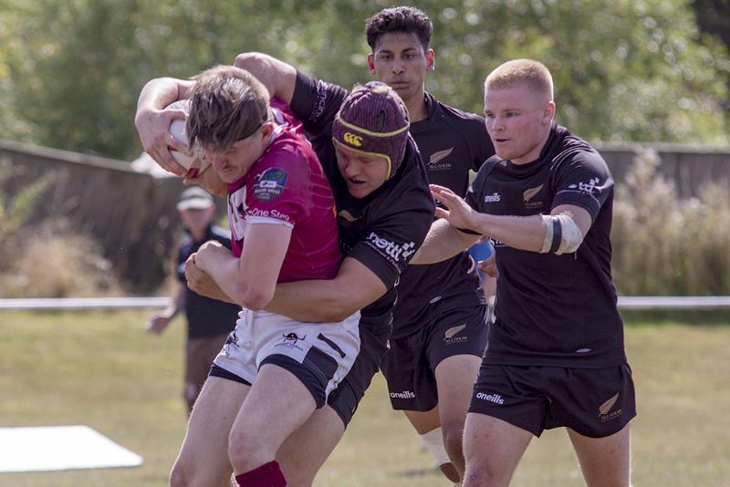 Sam Hodge wraps up a Viking with Luke Stephens and Kieran Webb in support. Picture, Lewis Mitchell