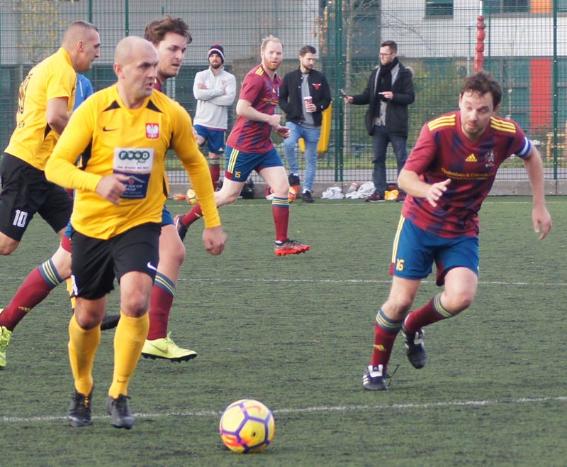 Action from the game between Cheltenham United and 303 Squadron