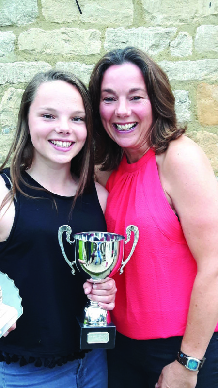 Mum Sarah with Abbie and her Cirencester under-16 coaches' award