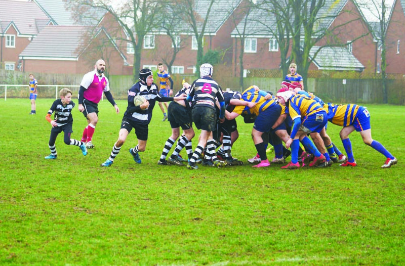 James Gunn prepares to make a break for Stow under-14s against Cheltenham Saracens. Picture, Stewart Hemley