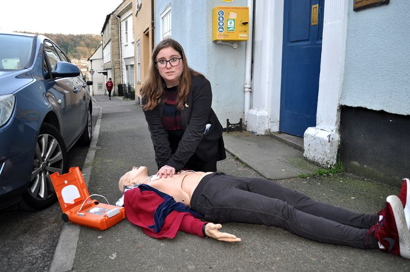 Year 13 student and a founding member of the British Heart Foundation’s new group at KLB school Becca Marsh demonstrating the use of a defib on a resuscitation mannequin.