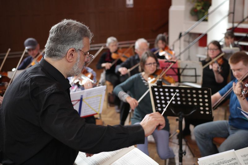 The Philharmonia and Conductor Ian Higginson during rehearsal. Photo, Marc Silverthorn