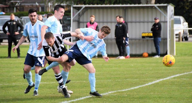 Action from Little Stoke against Gala Wilton (blue). Picture, Pete Langley