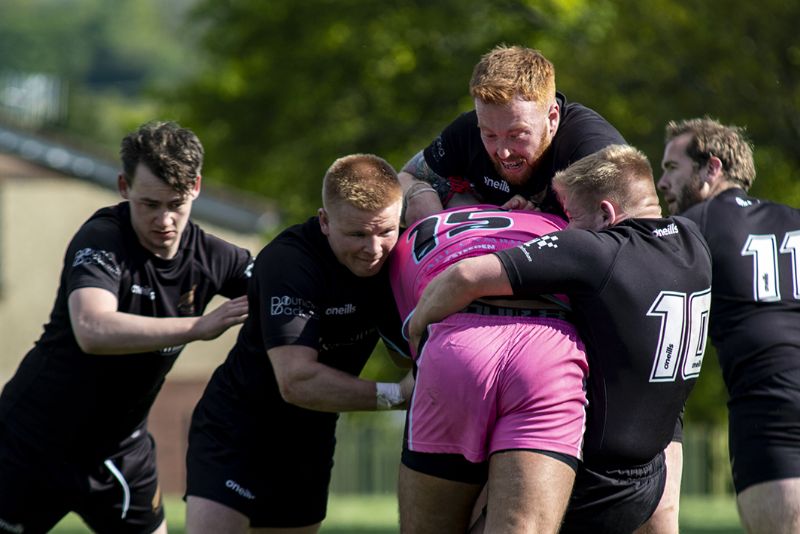 The Cougars’ Anton Ramsey is tackled by a group of All Golds players, left to right, Joe Uren, Luke Stephens, Paul Bolger, Mike Addis and Joe Collins. Picture, Lewis Mitchell Photography