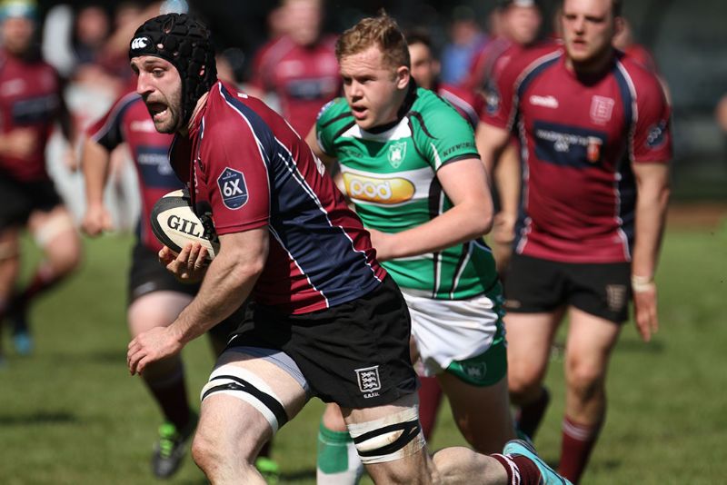 George Angell on the way to scoring his try for Gloucestershire