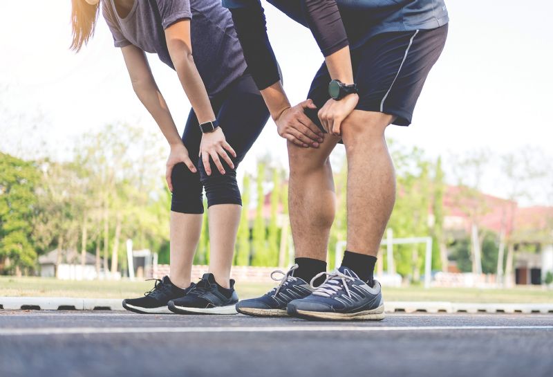 Man and woman resting running outdoor exercise fitness