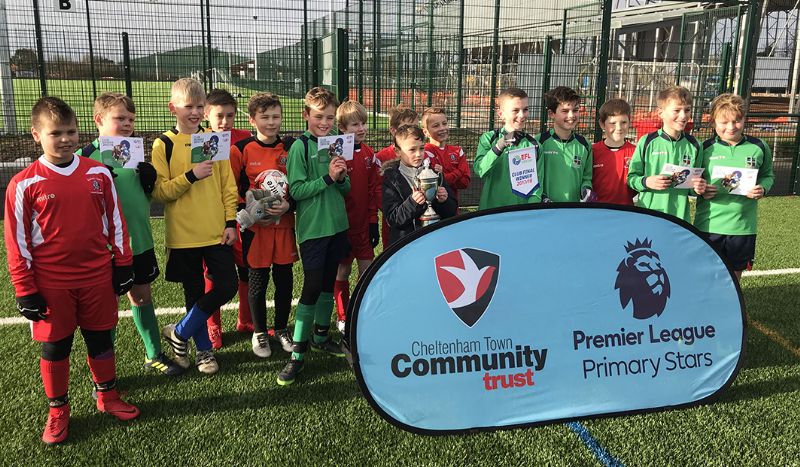 Longlevens (wearing green) and Bishop’s Cleeve contested the final