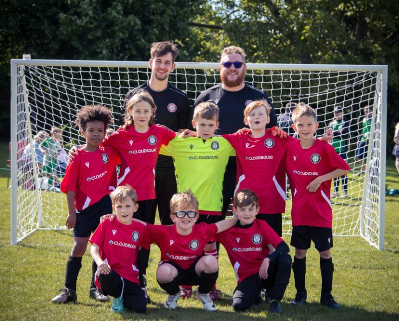 Cotswold Lions’ now under-9 team at their first and only tournament in Charlbury, with coaches Jamie Lewis, left, and Matty Madine