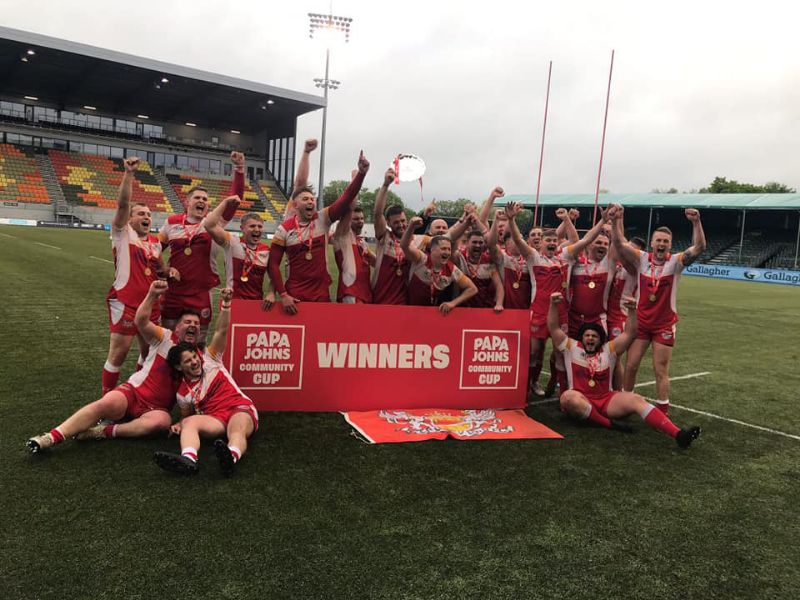 Longlevens celebrate their win at the StoneX Stadium