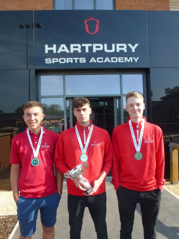 AoC Championships boys’ team winners, from left, James Freeman, Joe Buenfield and Max Teixeira