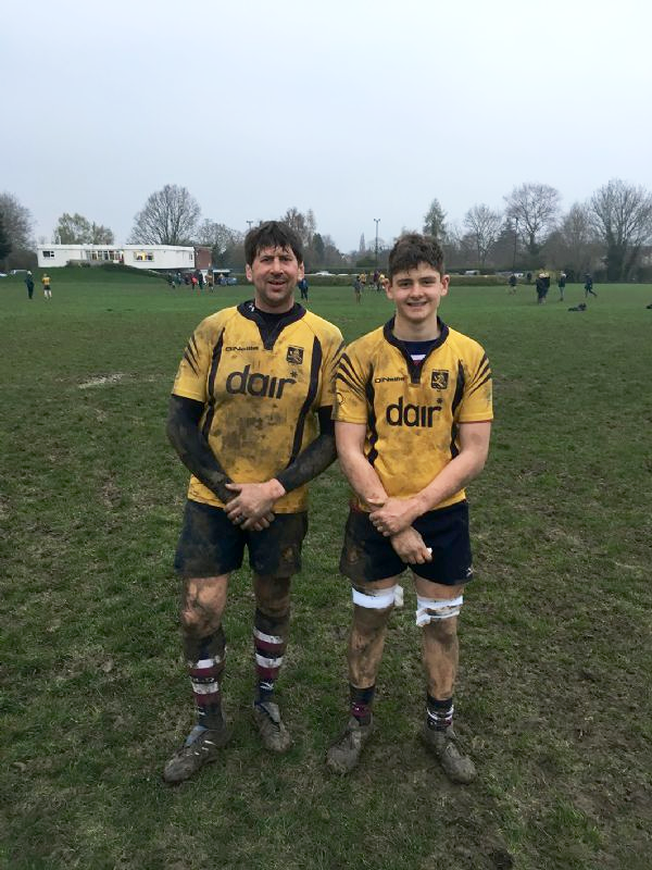 Rob and Ben Fidler at the end of the game against Gloucestershire Police