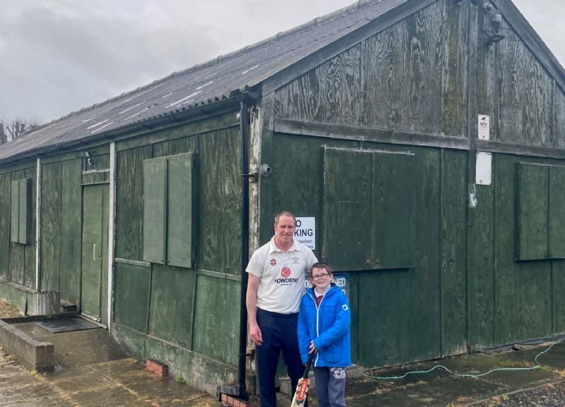 Ross Wakely with 11-year-old son and junior player Charlie outside Whitminster’s pavilion