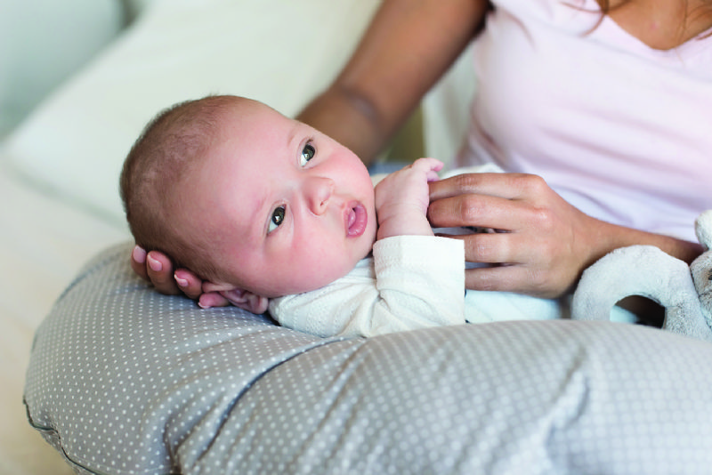 Newborn baby breastfeeding