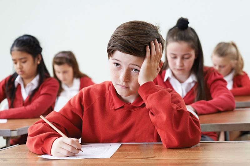 Young boy worried school uniform primary secondary school