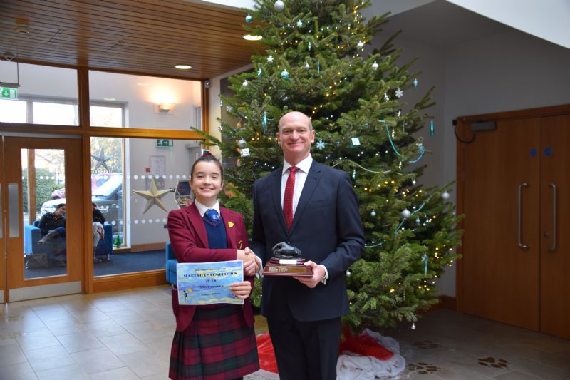 Year 8 pupil Connie with Dean Close Headmaster Paddy Moss