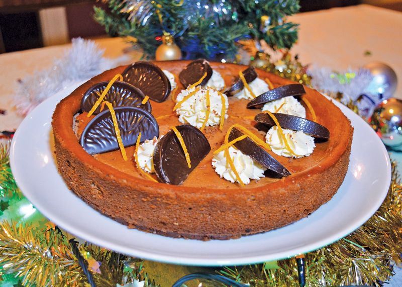 Baked chocolate and orange cheesecake festive dessert Christmas pudding