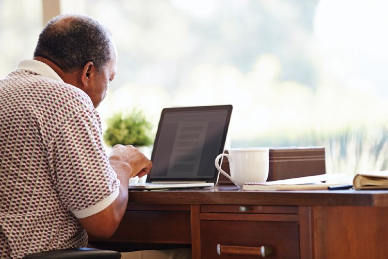 Man working from home office desk