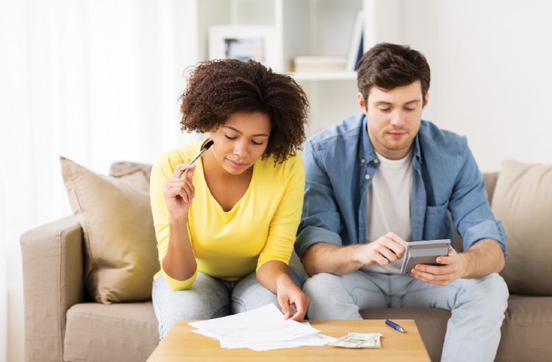 Young couple looking at their finances