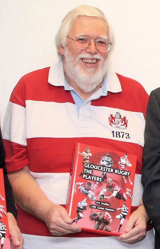 Gloucester Rugby Heritage chairman Malc King with one of their books